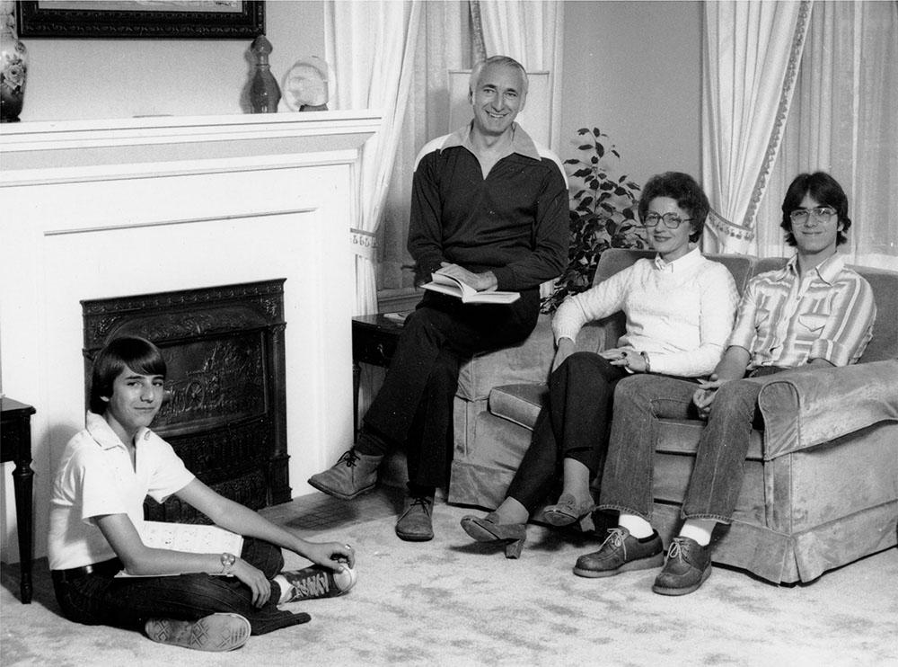 The Owens family poses for a photo in the Gaunt House living room.